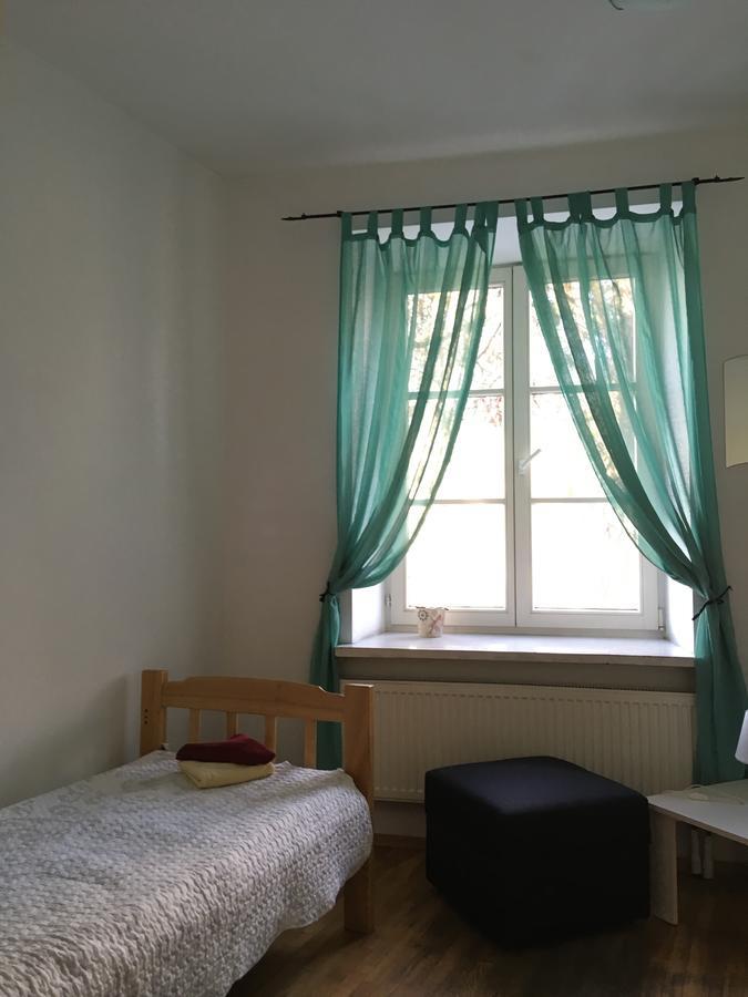 Pogo Hostel Vilnius Exterior photo A window with curtains