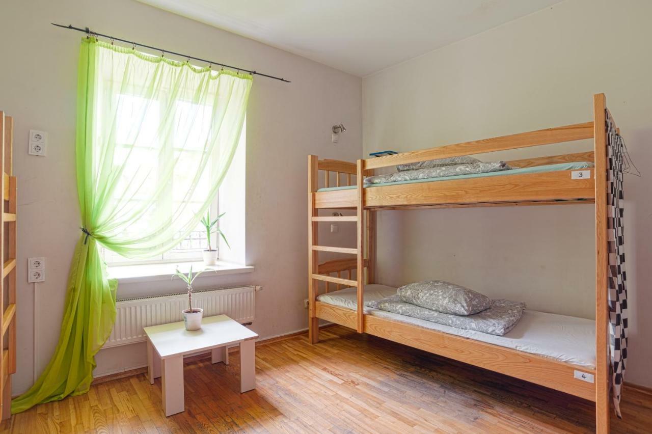 Pogo Hostel Vilnius Exterior photo A typical hostel room